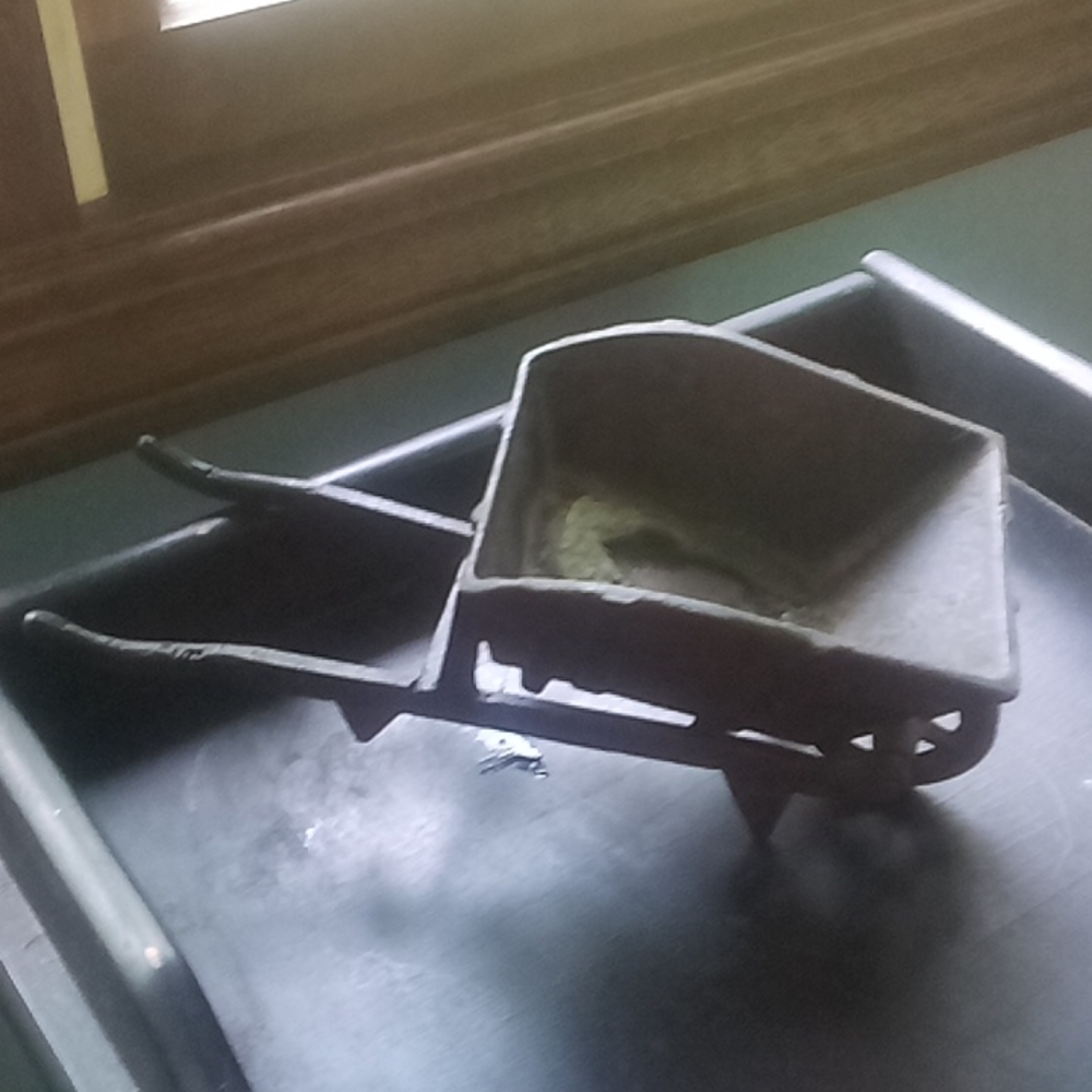 Hand forged folk art vintage iron minerature wheelbarrow